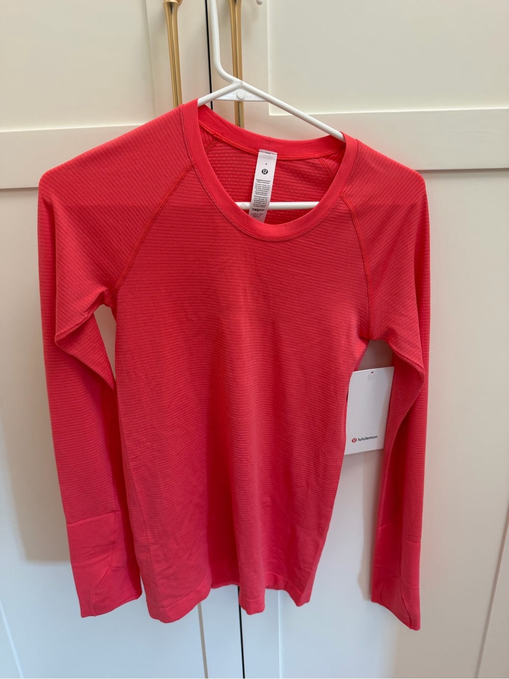 lululemon athletica Women's Long-Sleeve Crew in Vibrant Coral Pink